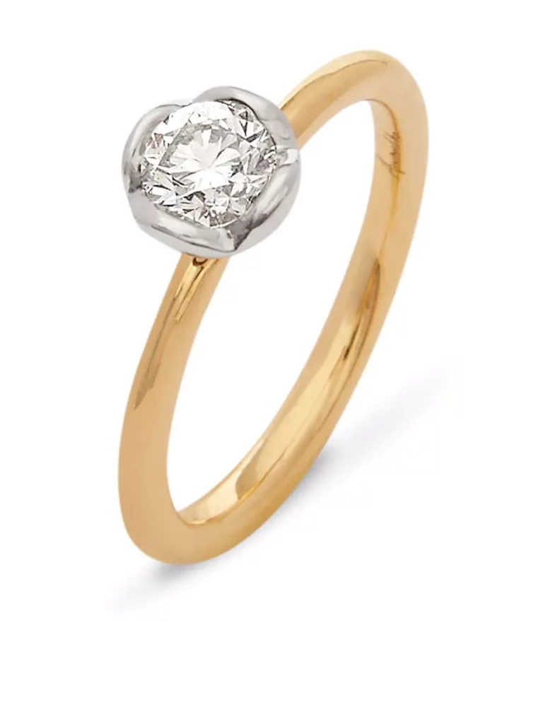 Bezel set 18k gold ring with diamond